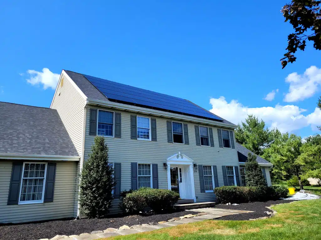 Home with solar panels on a sunny day