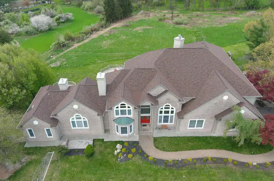 large house with roof that has lots of peaks