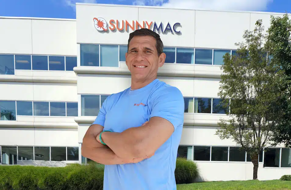 rick standing in front of the sunnymac building